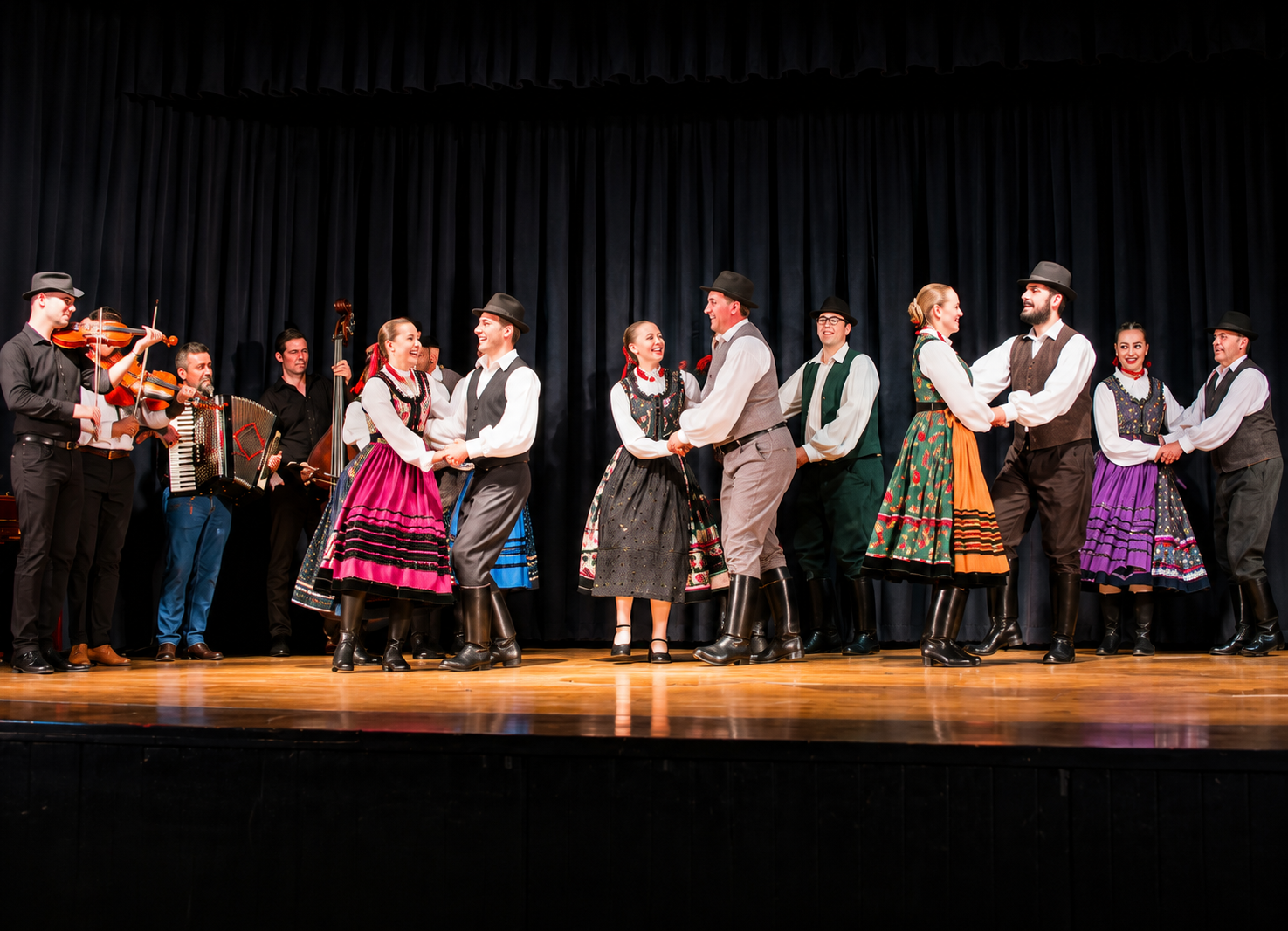 Hungarian folk dancers performing on stage